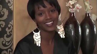 Ebony beauty masturbating at cosmetic table